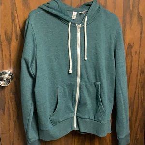 green zip-up sweatshirt